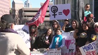 Pro-abortion rights advocates rally for change on Roe v. Wade's 50th anniversary