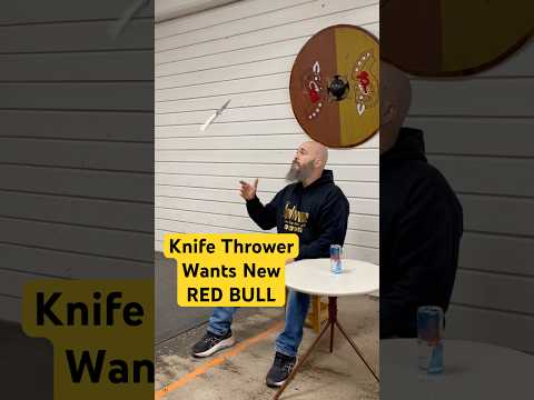 World champion knife and axe thrower stops Red Bull can from flying away!