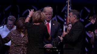 Trump being prayed over at the International Church of Las Vegas 10/30/16