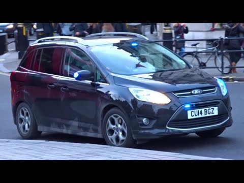 Unmarked London Police cars responding x2