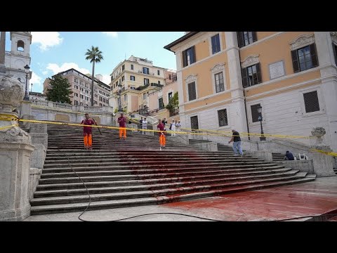 Video Thumbnail: WATCH: Spanish Steps painted red in protest against femicides