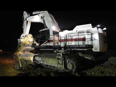 💪 High productivity - Liebherr R9100 loading Bell B50D - Part 1