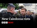 Macron says French police to remain in riot-hit New Caledonia | BBC News