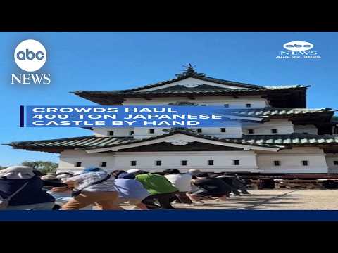 Crowds haul 400-ton Japanese castle by hand
