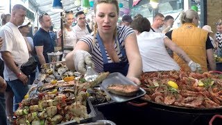 Huge Pans Cooking Huge Doses of Fish.  Kiev Street Food, Ukraine