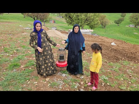 Sakina and her child's invitation in a heavy rain by Susan