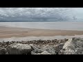 Fast incoming tide in Morecambe Bay - UK - 14/06/2022