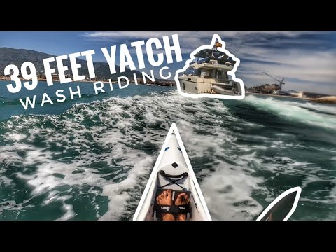 Chasing boat waves with my surfski