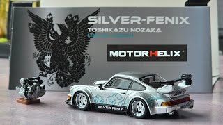 MOTORHELIX PORSCHE SILVER FENIX. A DIECAST CAR AND PIECE OF ART. 1/64 scale.
