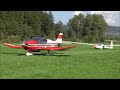 Glider Being Towed By A Plane For Take Off Amlikon Switzerlan 07 09 2014