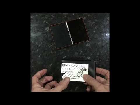 Torn and restored business card magic trick
