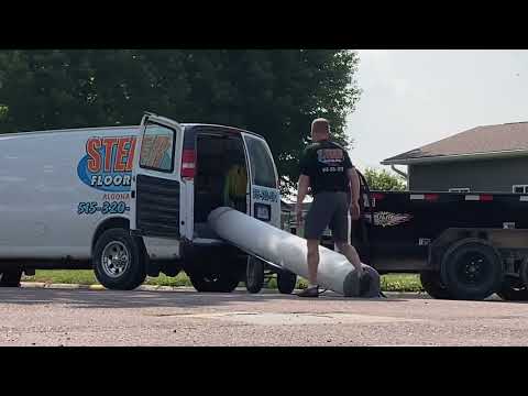 Moving gigantic roll of carpet￼