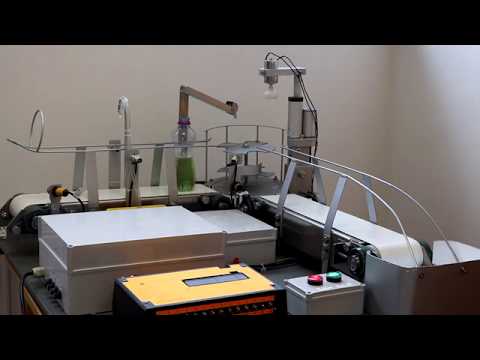 Automatic bottle filling & capping machine controlled by PLC S7-1200