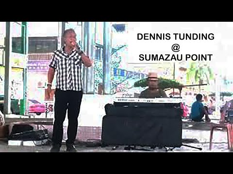 DENNIS LEADER OF THE MOYOG SONGKOTOUN BUSKERS
