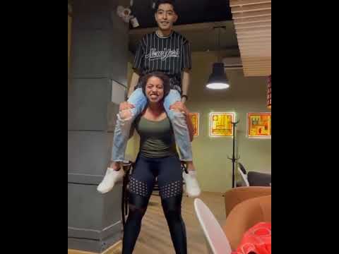 woman power lift carry man