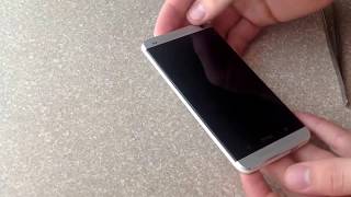 How to insert / eject a SIM card on a HTC One