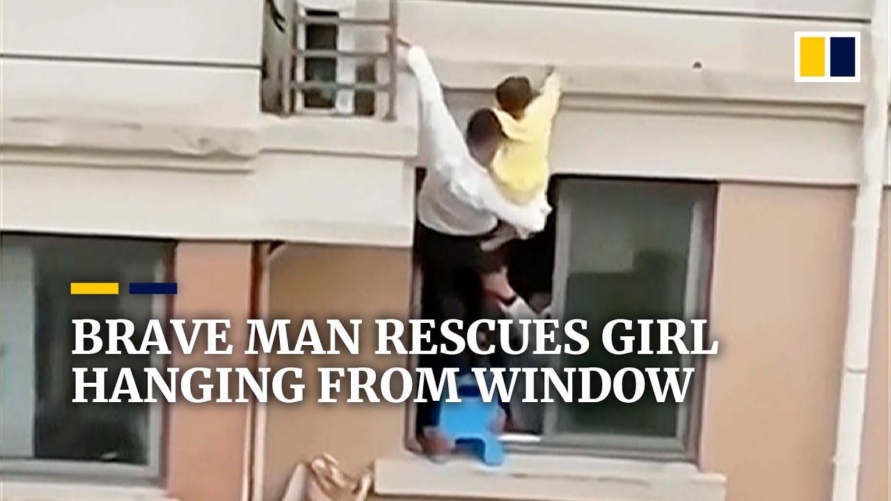 Brave man in China rescues 4-year-old girl hanging from window
