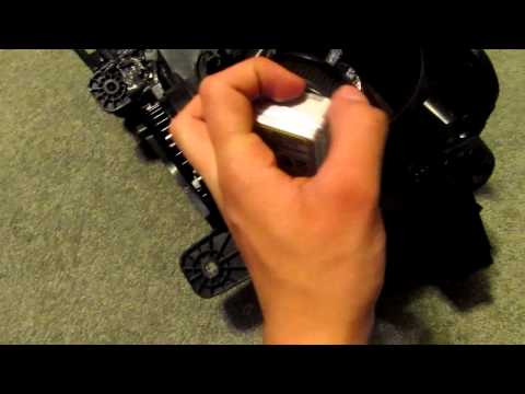 How to remove hid bulb from camaro headlight - YouTube