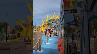 Riding the tram to the entrance of Celebration Key #cruise Carnival Freedom