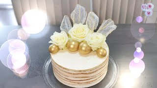 Naked Cake Hochzeitstorte mit Blumen, Reispapier und Schokoladenkugeln - Geburtstagstorte