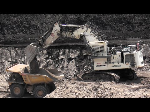 Liebherr R9350 Excavator Loading Komatsu HD785 & CAT 777 Dump Trucks - Coal Mining Operations