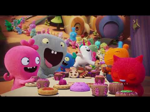 UglyDolls official trailer thumbnail showing Moxy, Ox and the crew charging toward Perfection — album-and-trailer context
