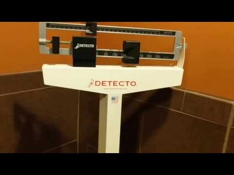 How to use a mechanical weighing scale