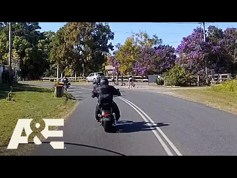 Biker vs. Cyclist Showdown: Rude Gesture Ends in a PUNCH | Road Wars | A&E