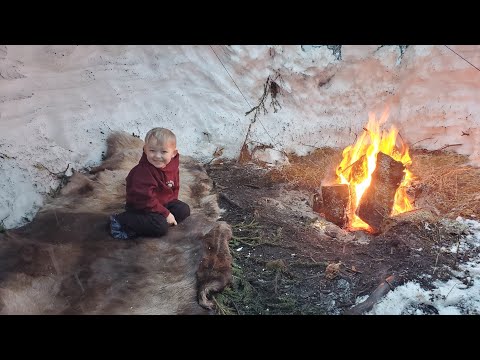 Winter Camping in Bushcraft Shelter with Animal Hides for a Bed (in Deep Snow)