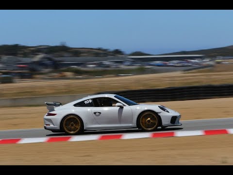 Porsche GT3 991.2 at Laguna Seca getting a little slide in Turn 11