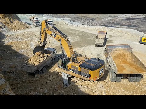 Caterpillar 390D Excavator Loading Caterpillar 775E Dumper And Trucks - Pyramis Ate