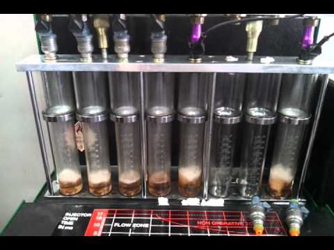 Injector Dynamics ID2000 2000cc and Bosch 1600cc Indy Blue fuel injector flow test @ 7000rpm