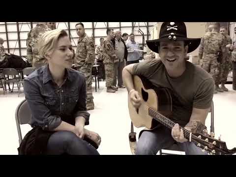 Scarlett Johansson visits the troops and sings a song