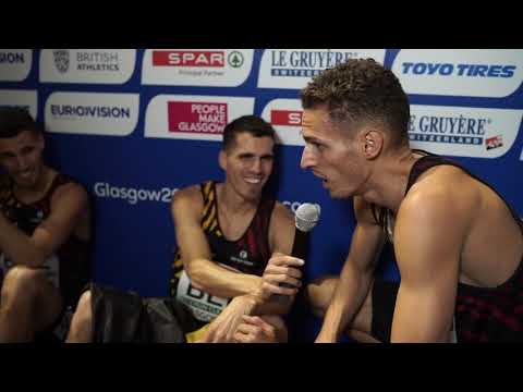 Belgian team interviewing each other in the mixed zone after winning Gold in the 4x400m