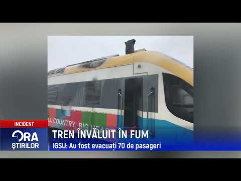 TREN ÎNVĂLUIT ÎN FUM