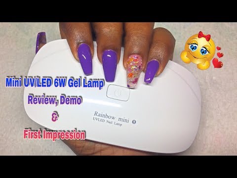 Part of a video titled AmoVee Mini Nail Lamp 6W LED UV Nail Dryer for Gel Polish - YouTube