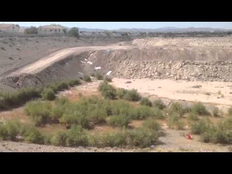 Filling up an old gravel quarry pit
