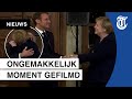 Knuffel? Ongemak tussen Macron en Merkel