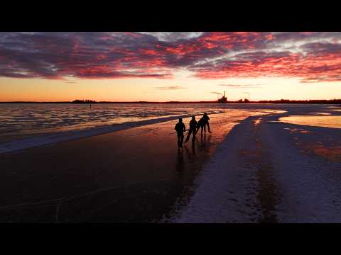 Julhälsning från Mälarenergi - Gläns över sjö och strand