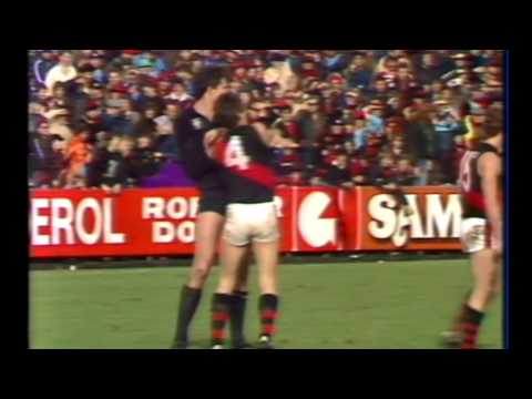 Funny vision of Justin Madden and Leon Baker fighting over the ball 1984 Round 19