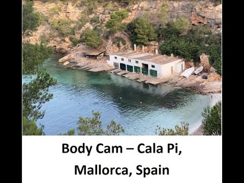 An early morning walk around Cala Pi, Mallorca, Spain taking in the town, beach and ancient tower.