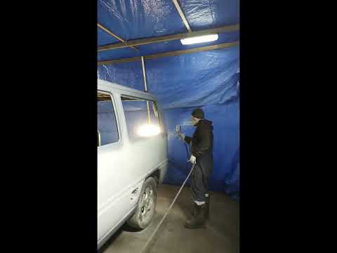 Applying acrylic primer. Reflex HS Primer Surfacer 4+1