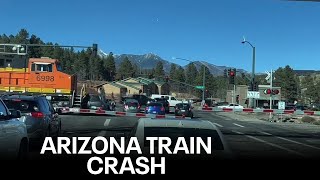 Train smashes car partially on railroad in Flagstaff, several people narrowly missed