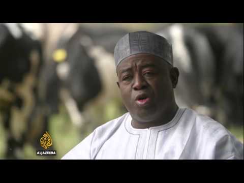 Oil slump driving inflation and currency drop in Nigeria