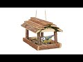 Vogelfutterhaus mit Rinde Braun - Holzwerkstoff - Naturfaser - 21 x 19 x 32 cm
