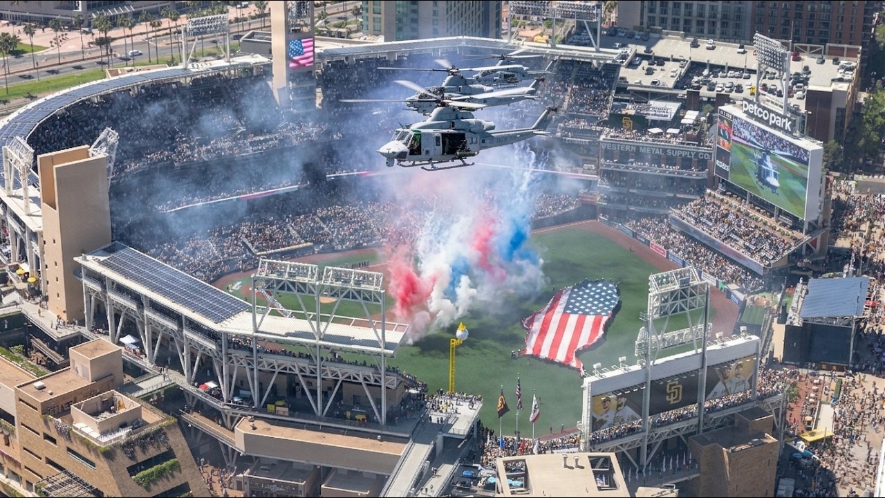 United States Marine Corps Helicopters AH-1Z Vipers and UH-1Y Venoms Fly Over San Diego Padres