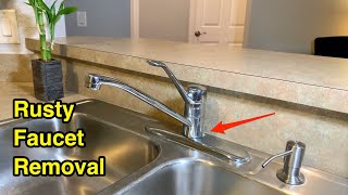 How to unscrew and take out old rusty kitchen faucet retaining nut.