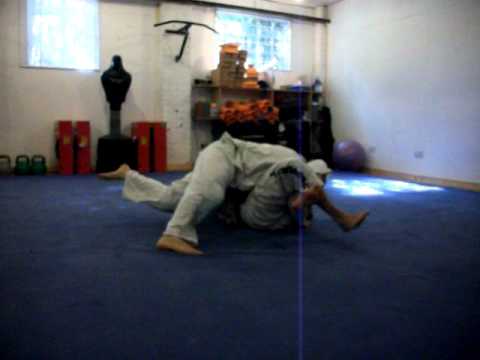 Jon Bull vs Jamie decroos.  Jumping reverse triangle