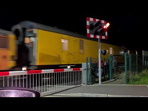 37219 & 37116 pass Elgin Level Crossing working the Scottish North West PLPR 31st Oct 2020