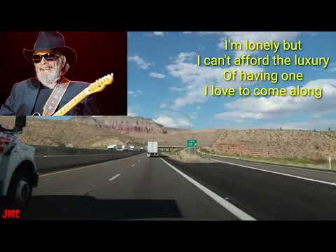 Merle Haggard - I'm lonesome fugitive(The highway is my home)Lyrics Video